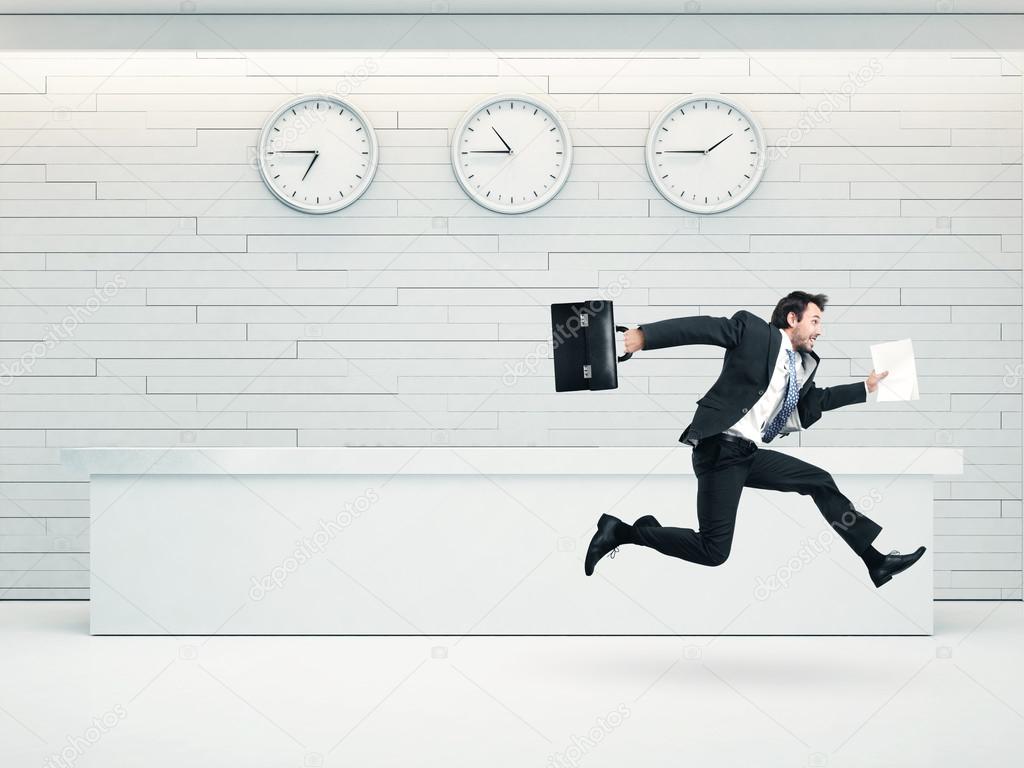 Businessman running with a briefcase