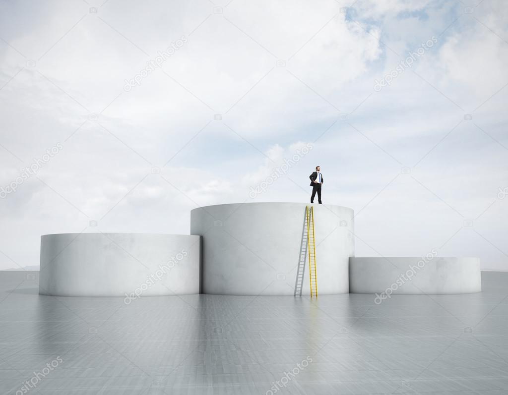 Businessman on top of the podium