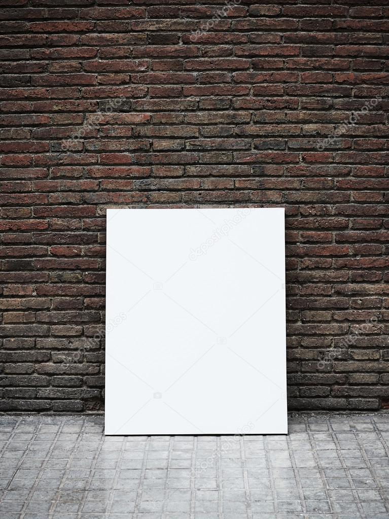 Stone wall and blank poster