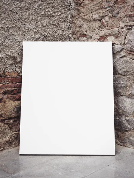 Parede de tijolo e cartaz em branco — Fotografia de Stock