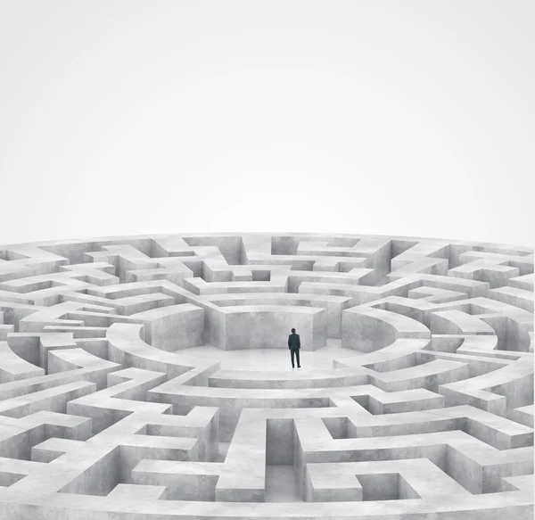 Businessman in the middle of a maze — Stock Photo, Image