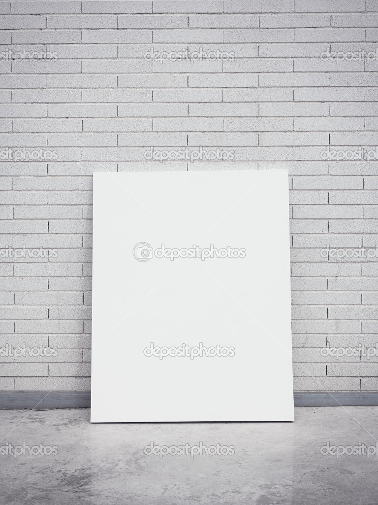 Blank poster on a brick wall