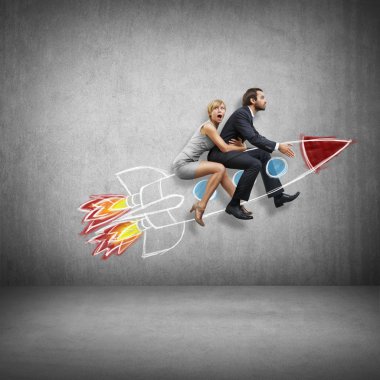 Businessman and young woman flying with rocket clipart