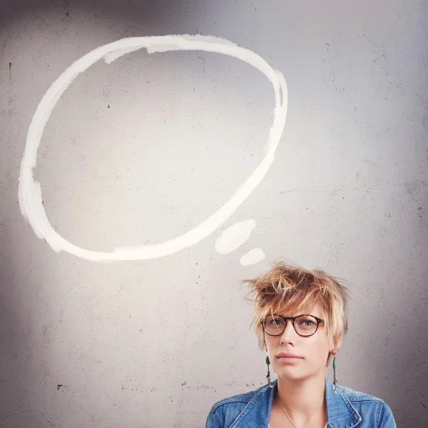 Upset young woman with bubble speech — Stock Photo, Image