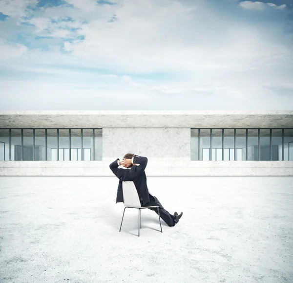 Businessman looking at new house — Stock Photo, Image