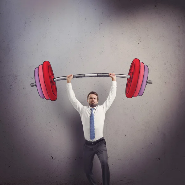 Empresário levantando barbell — Fotografia de Stock