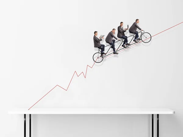 Group of businessmen on bicycle — Stock Photo, Image