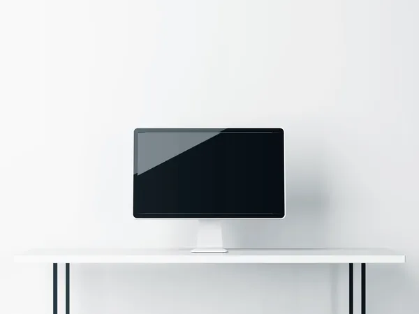 Beyaz masa üstünde bilgisayar göstermek — Stok fotoğraf