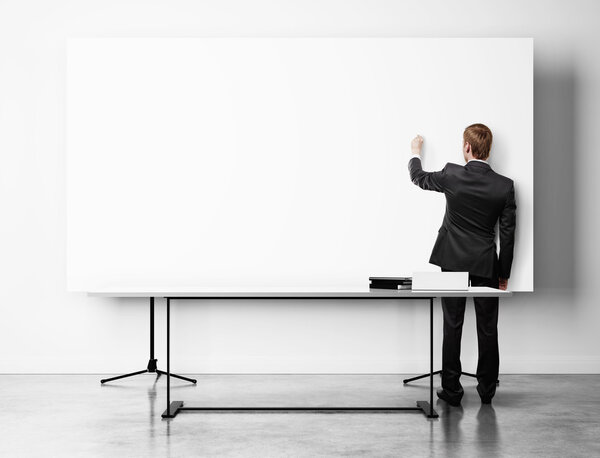 Businessman with  flip chart