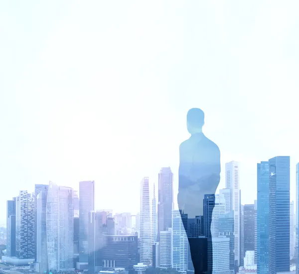 Businessman and city — Stock Image Businessman and city Stock Photo
