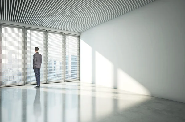 Businessman near window — Stock Photo, Image