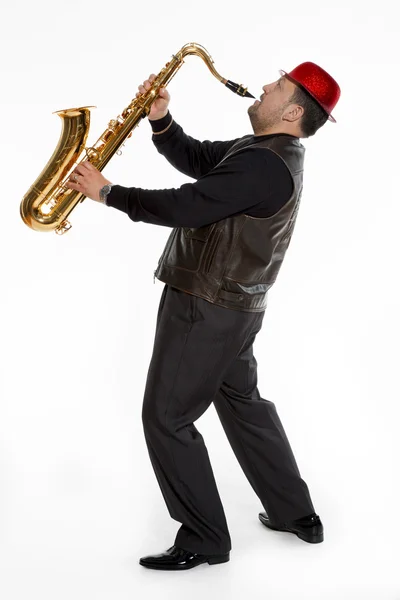 Saxophonist with a bristle — Stock Photo, Image