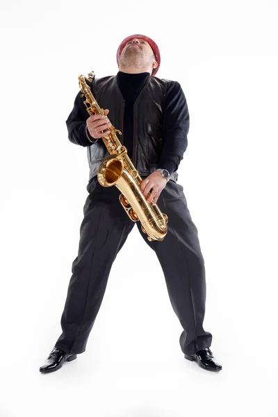 Saxophonist with a bristle — Stock Photo, Image