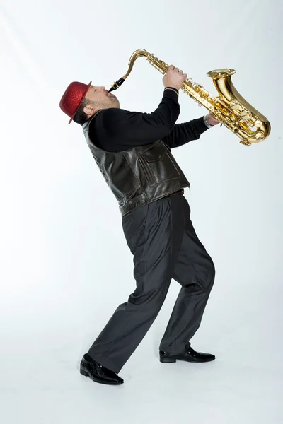 Saxophonist with a bristle — Stock Photo, Image