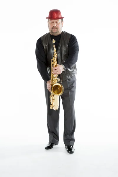 Saxophonist with a bristle — Stock Photo, Image