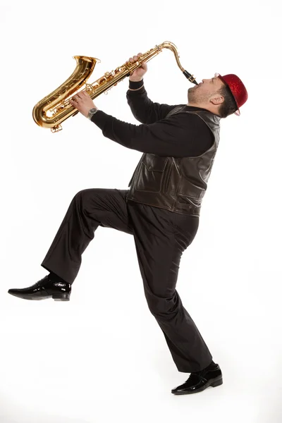 Saxophonist with a bristle Royalty Free Stock Images