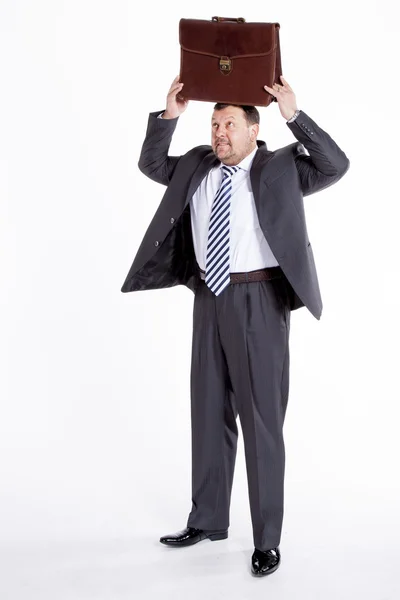 Saxophonist under an umbrella — Stock Photo, Image