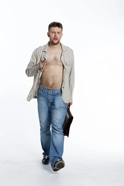 Macho man in de jas op een naakte lichaam met een portefeuille — Stockfoto
