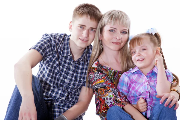 Portrait of happy mother and her children lying, sitting, playin — Stock Photo, Image