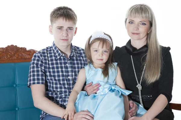 Portrait of happy mother and her children lying, sitting, playin — Stock Photo, Image