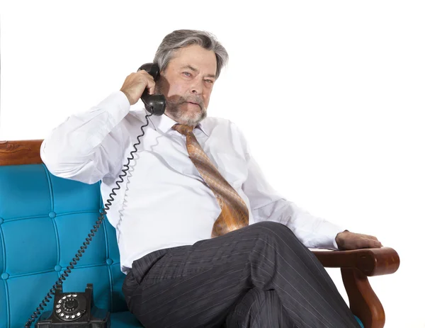 Empresário falando ao telefone — Fotografia de Stock