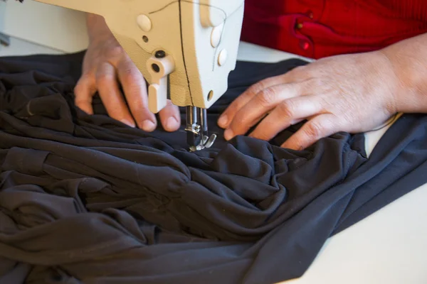 Hand sewing on a machine — Stock Photo, Image