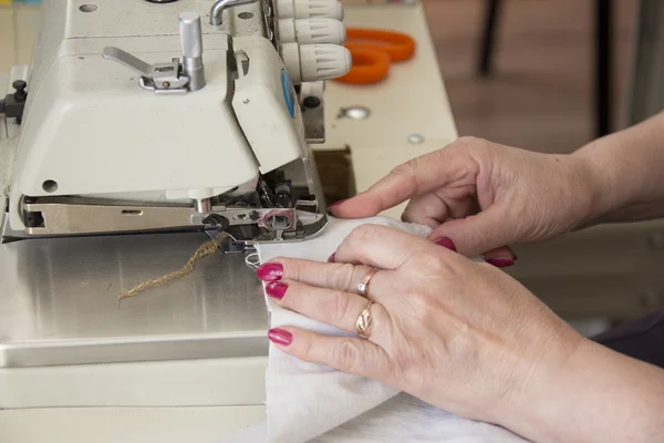 Hand sewing on a machine — Stock Photo, Image