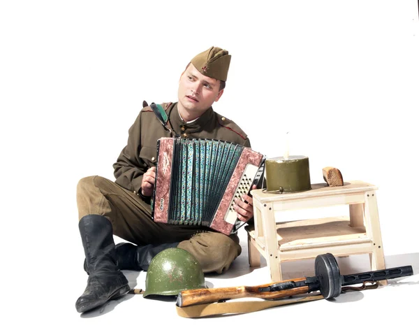 Asker akordeon ile — Stok fotoğraf