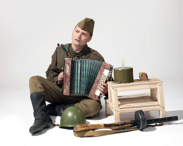 Żołnierz z akordeonu — Zdjęcie stockowe