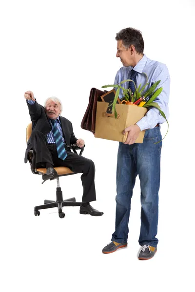 Chief kicks out the dismissed worker — Stock Photo, Image