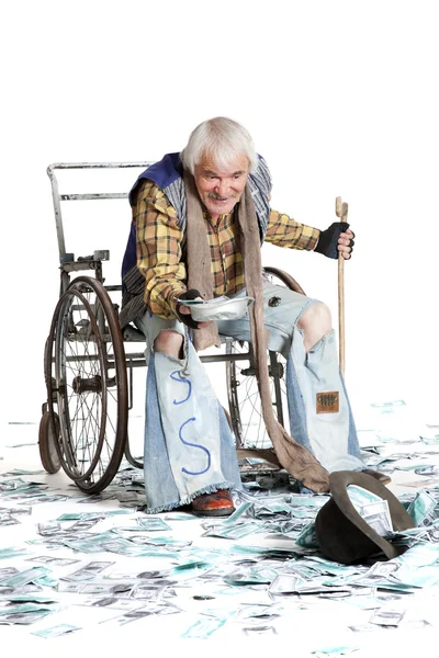 Homeless man with a lot of money — Stock Photo, Image