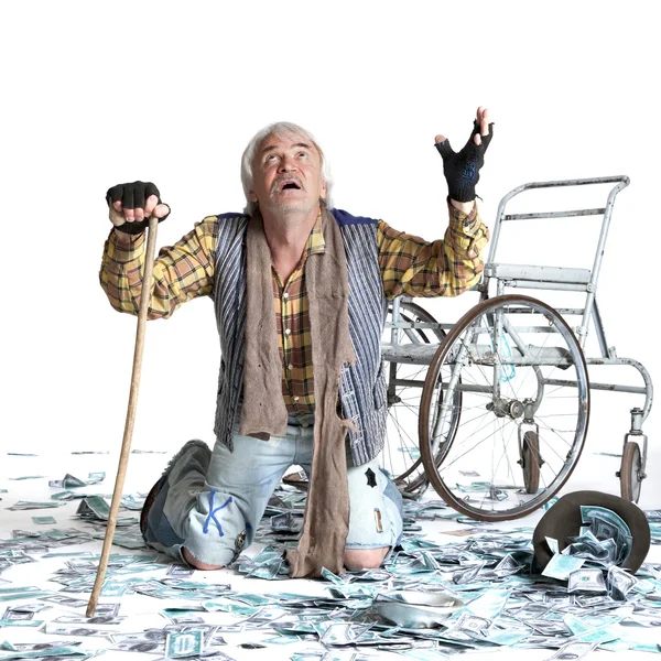 Homeless man with a lot of money — Stock Photo, Image