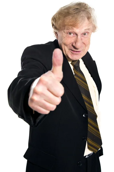 Senior businessman with thumbs up — Stock Photo, Image