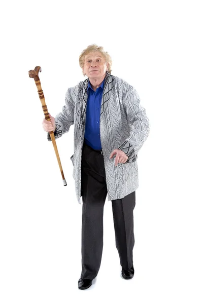 An elderly man walking with stick — Stock Photo, Image