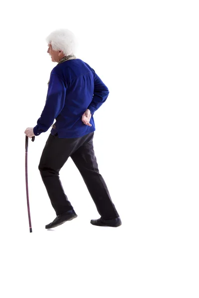 Elderly man with a cane and pain in the back — Stock Photo, Image