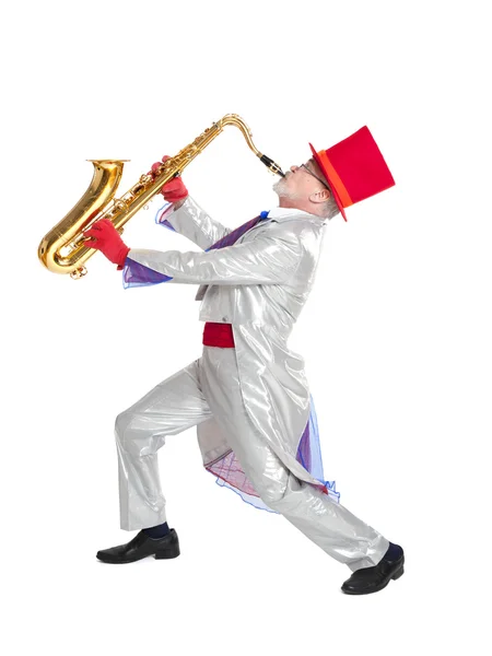 Magician plays the trumpet — Stock Photo, Image