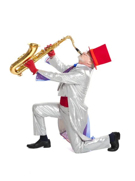 Zauberer spielt Trompete — Stockfoto