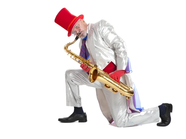 Magician plays the trumpet — Stock Photo, Image