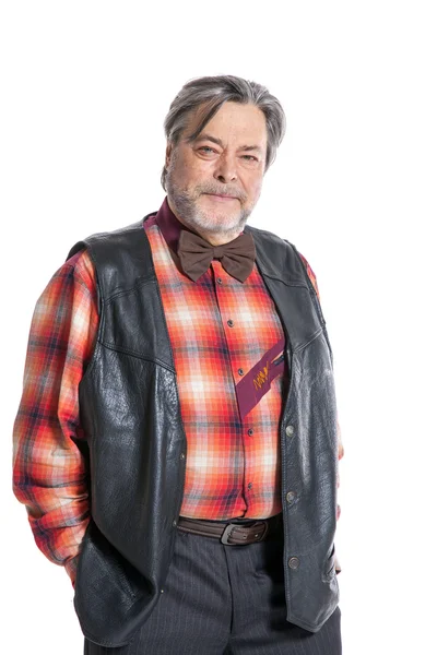 Oudere man in een plaid shirt en een strikje — Stockfoto