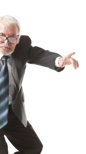 Senior business man pointing to the left — Stock Photo, Image