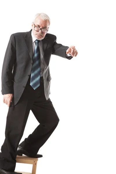 Senior business man pointing to the straight — Stock Photo, Image