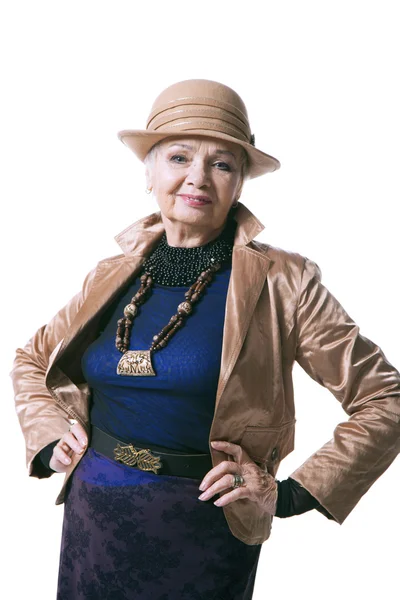 Senior blond woman in a hat with jacket — Stock Photo, Image