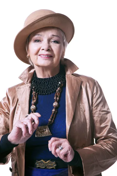 Senior blond woman in a hat with jacket — Stock Photo, Image