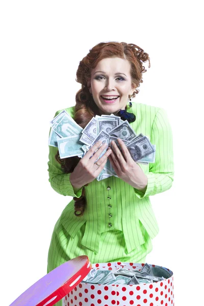 Счастливая женщина с деньгами в коробке — стоковое фото