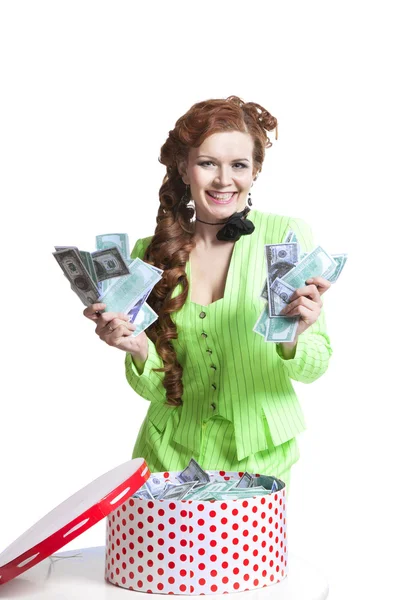 Gelukkige vrouw met geld in een doos — Stockfoto