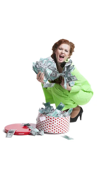 Menina surpresa com dinheiro em uma caixa — Fotografia de Stock