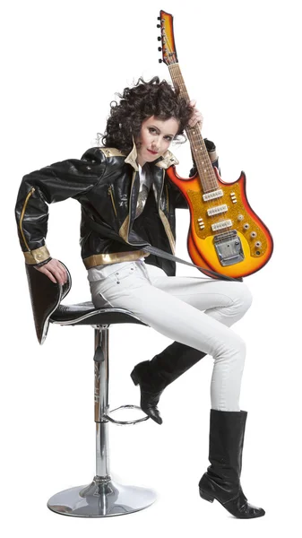 Girl   sitting on the chair with  electro guitar — Stock Photo, Image