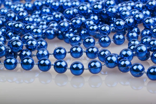 Blue christmas beads — Stock Photo, Image