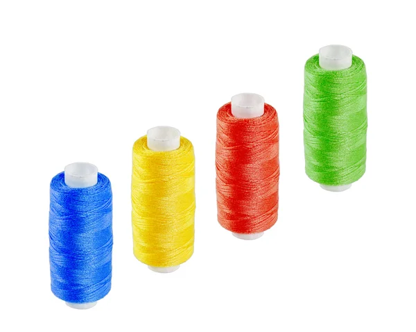 Four multi-colored skeins of thread — Stock Photo, Image