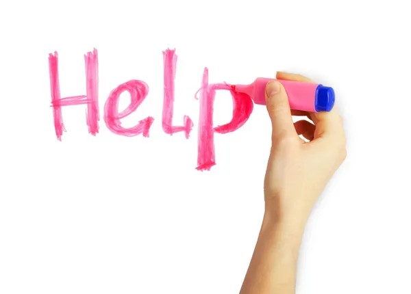 女子手里，用粉红色标记写的词"帮助"，在一张白纸 — 图库照片